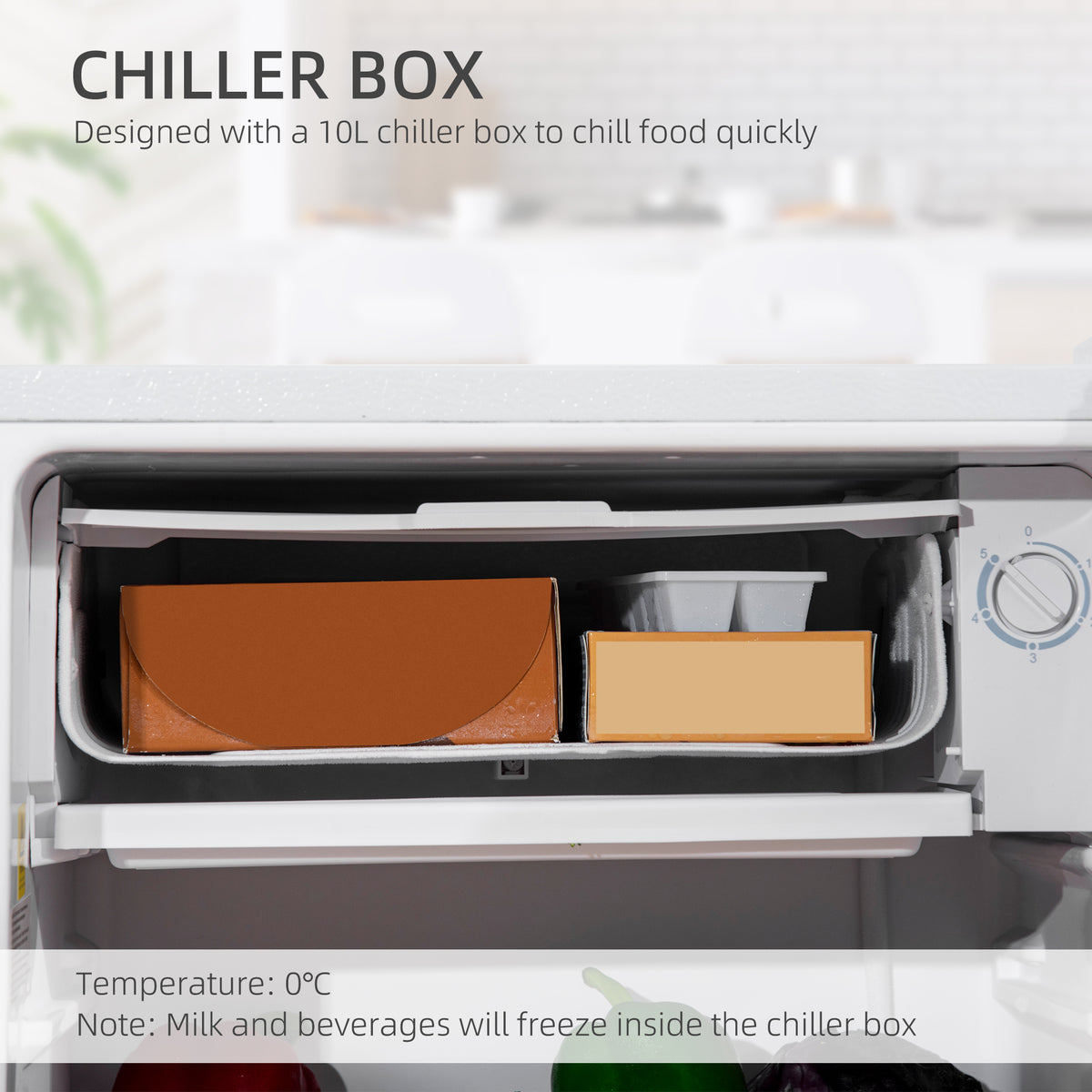 Fridge chiller box with two food containers and a temperature dial.