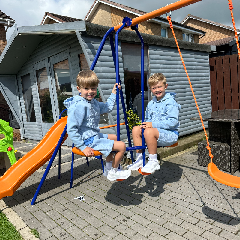 Outsunny Four-In-One Metal Garden Swing Set, with Double Swings, Glider, Slider, Ladder - Orange and Blue