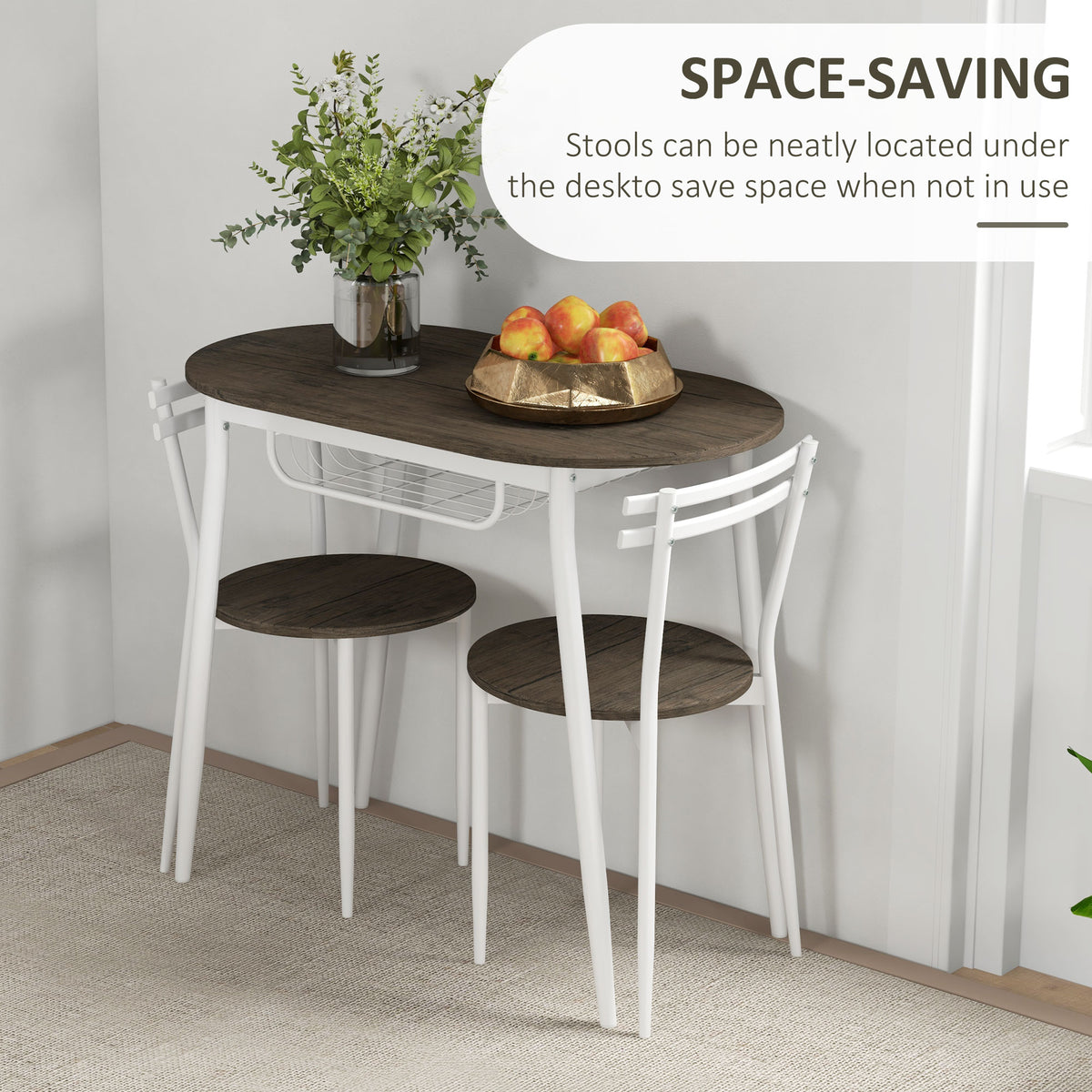 Oval dining table with two chairs tucked beneath, dark wood-look tops, white frames, and wire shelf