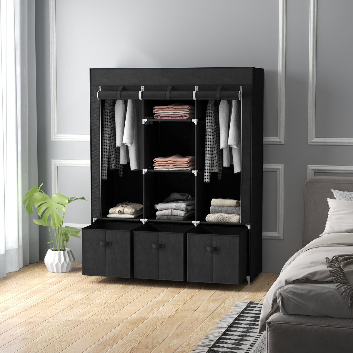 Black fabric wardrobe with clothes rails, shelves, and three drawers
