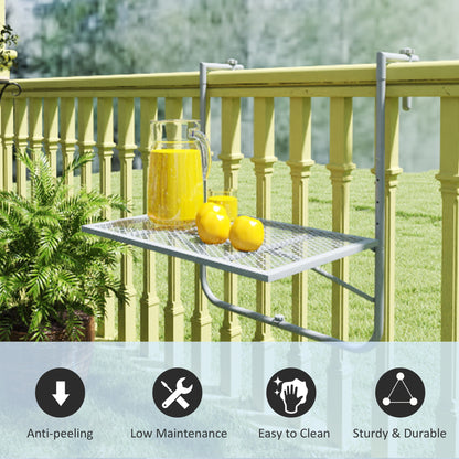 Grey metal balcony table mounted on a railing, with a pitcher and fruit on its grid top
