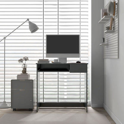 Grey computer desk shown from the front with a monitor on top.