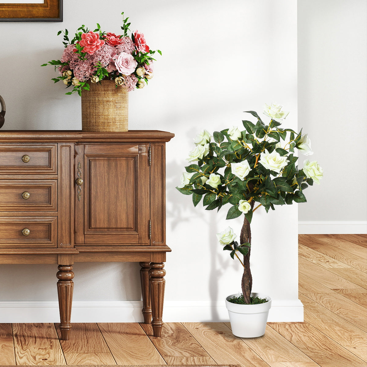 Outsunny faux white rose tree displayed beside a wooden cabinet