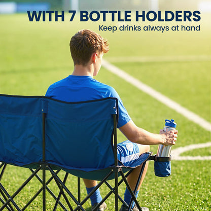 Blue folding camping chair with a bottle holder attached to the side