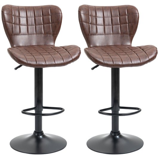 Pair of brown faux leather adjustable bar stools with quilted backs, footrests and black bases
