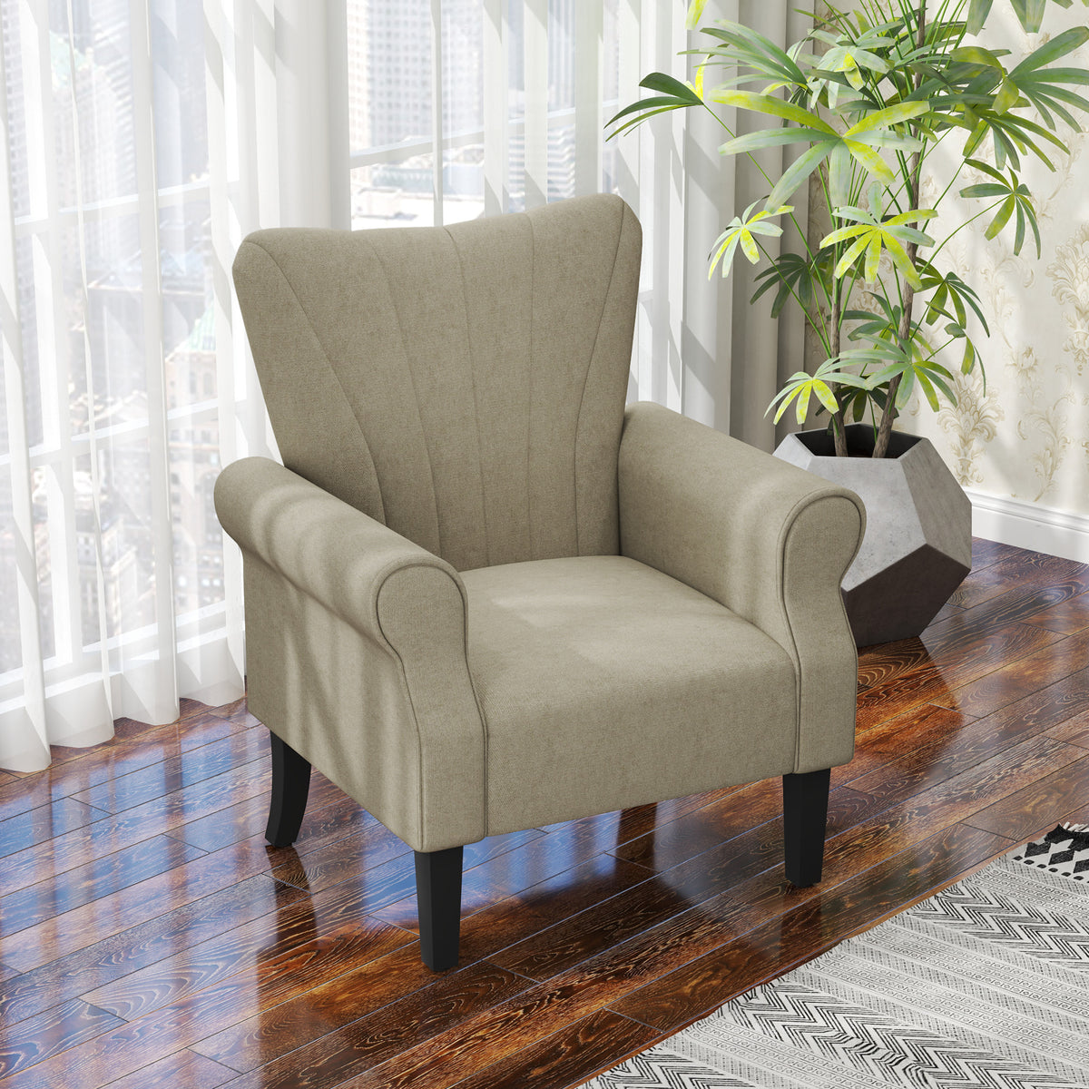 Beige upholstered accent chair with a channel-stitched back, rolled arms and black legs.