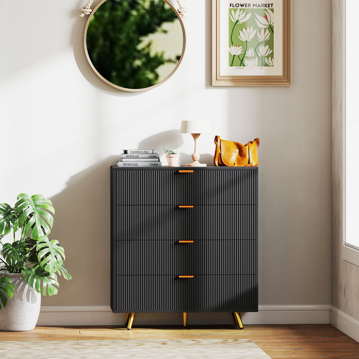 Black four-drawer bedside table with fluted fronts and gold-tone legs, shown in a room