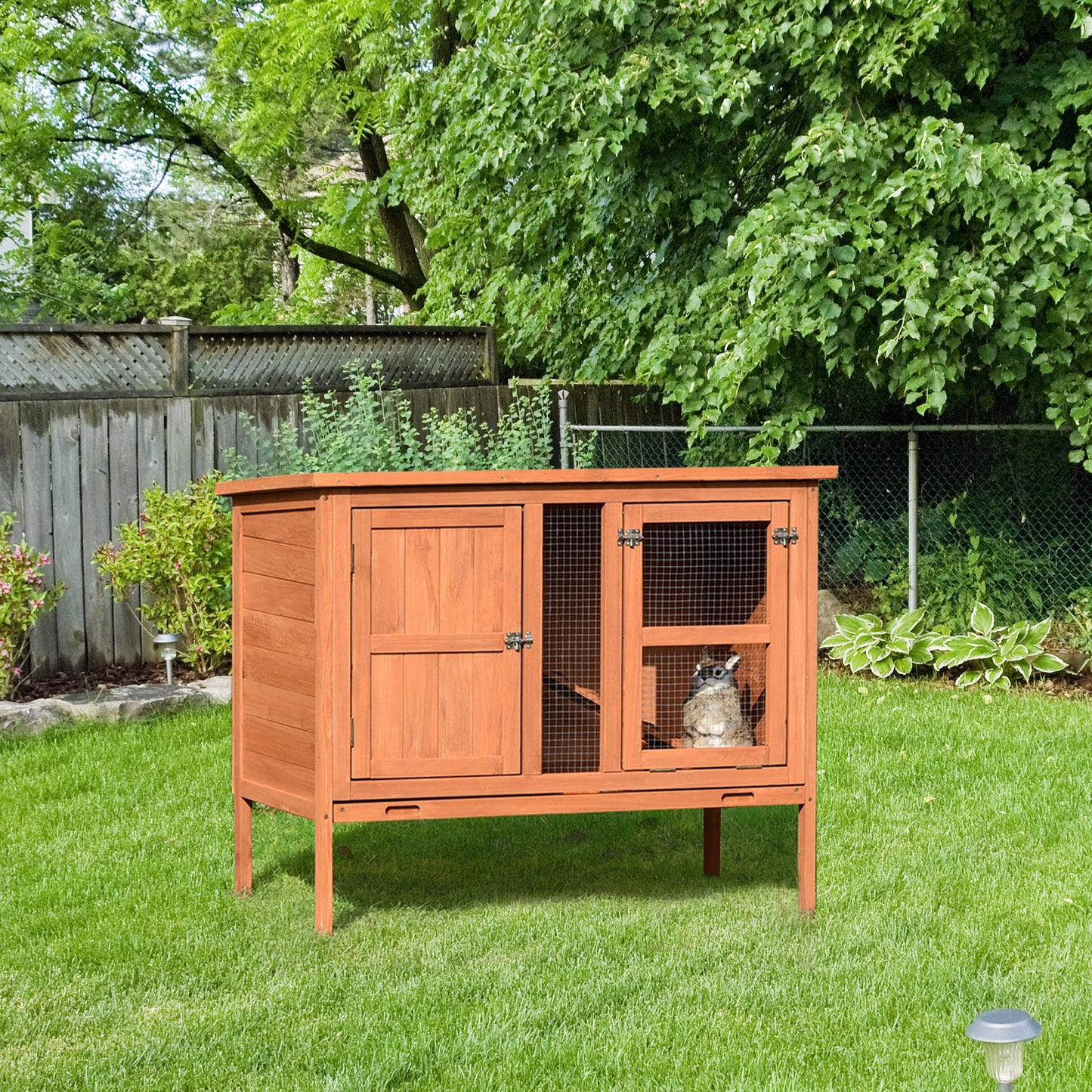 Photo of PawHut Wooden Guinea Pigs Hutches Elevated Pet Bunny House with Slide-Out Tray Openable Roof in Roof colour on a white background