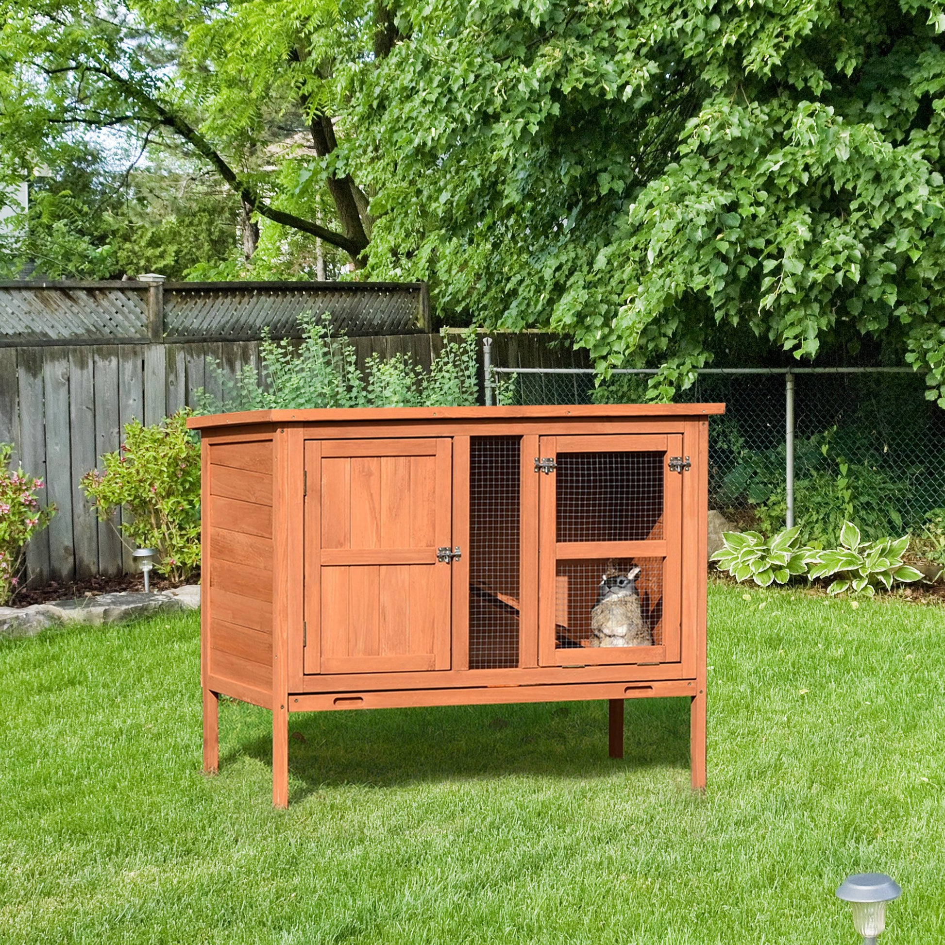 Photo of PawHut Wooden Guinea Pigs Hutches Elevated Pet Bunny House with Slide-Out Tray Openable Roof in Roof colour on a white background