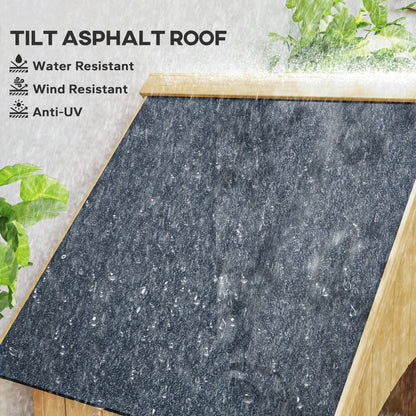 Wooden garden storage shed roof with dark asphalt covering and sloped design