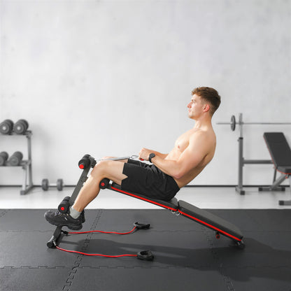 HOMCOM sit-up bench in use for an assisted crunch, with resistance bands attached