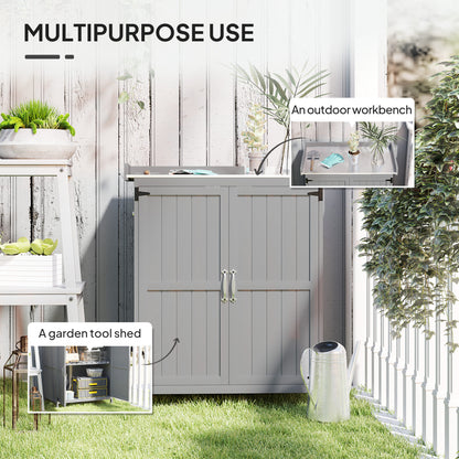Grey wooden garden shed with double doors, shown as a garden tool store and outdoor workbench
