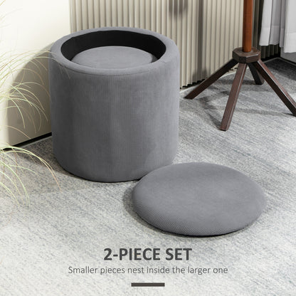 Grey corduroy storage ottoman opened to show the smaller ottoman nested inside