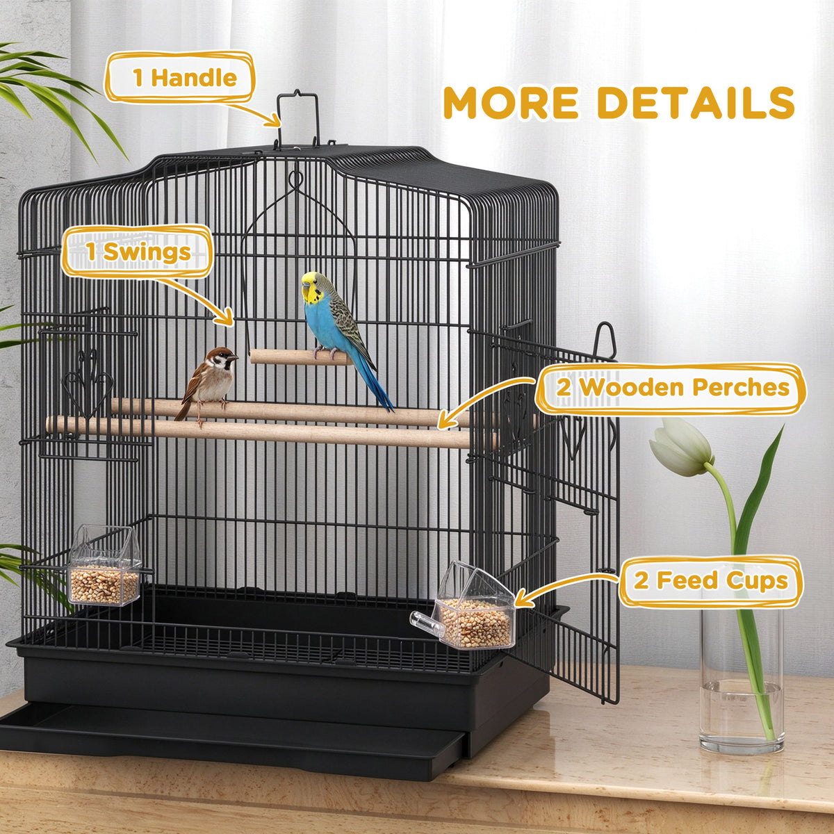 Black bird cage with carry handle, swing, two wooden perches, and two food cups