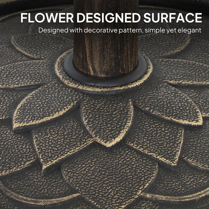 Close-up of the resin parasol base's raised flower pattern and textured bronze-tone finish