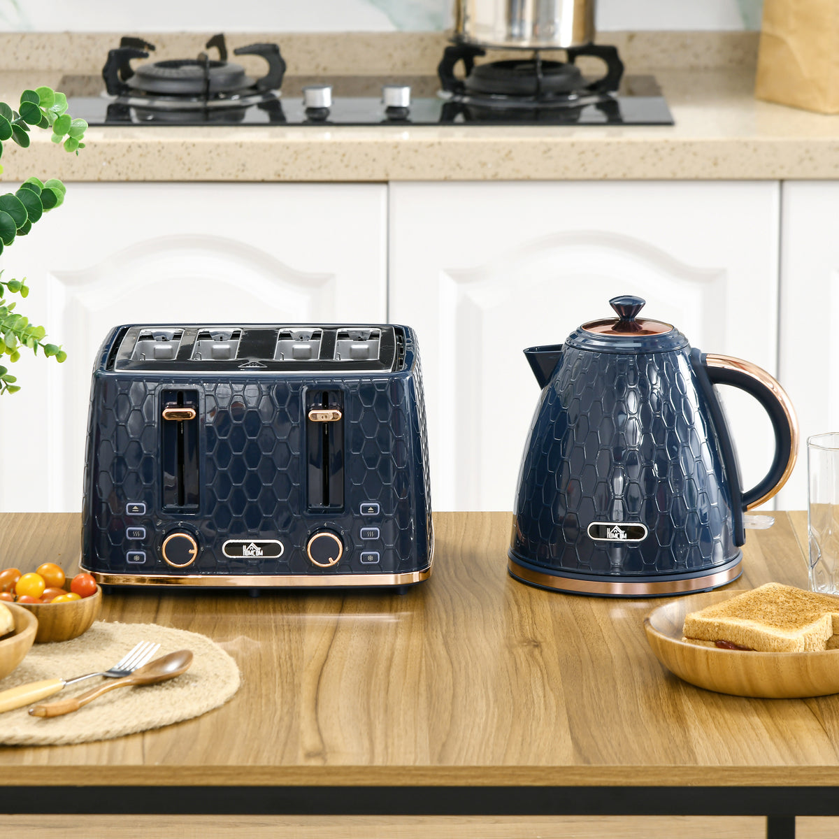 Blue kettle and four-slice toaster set with rose gold trim