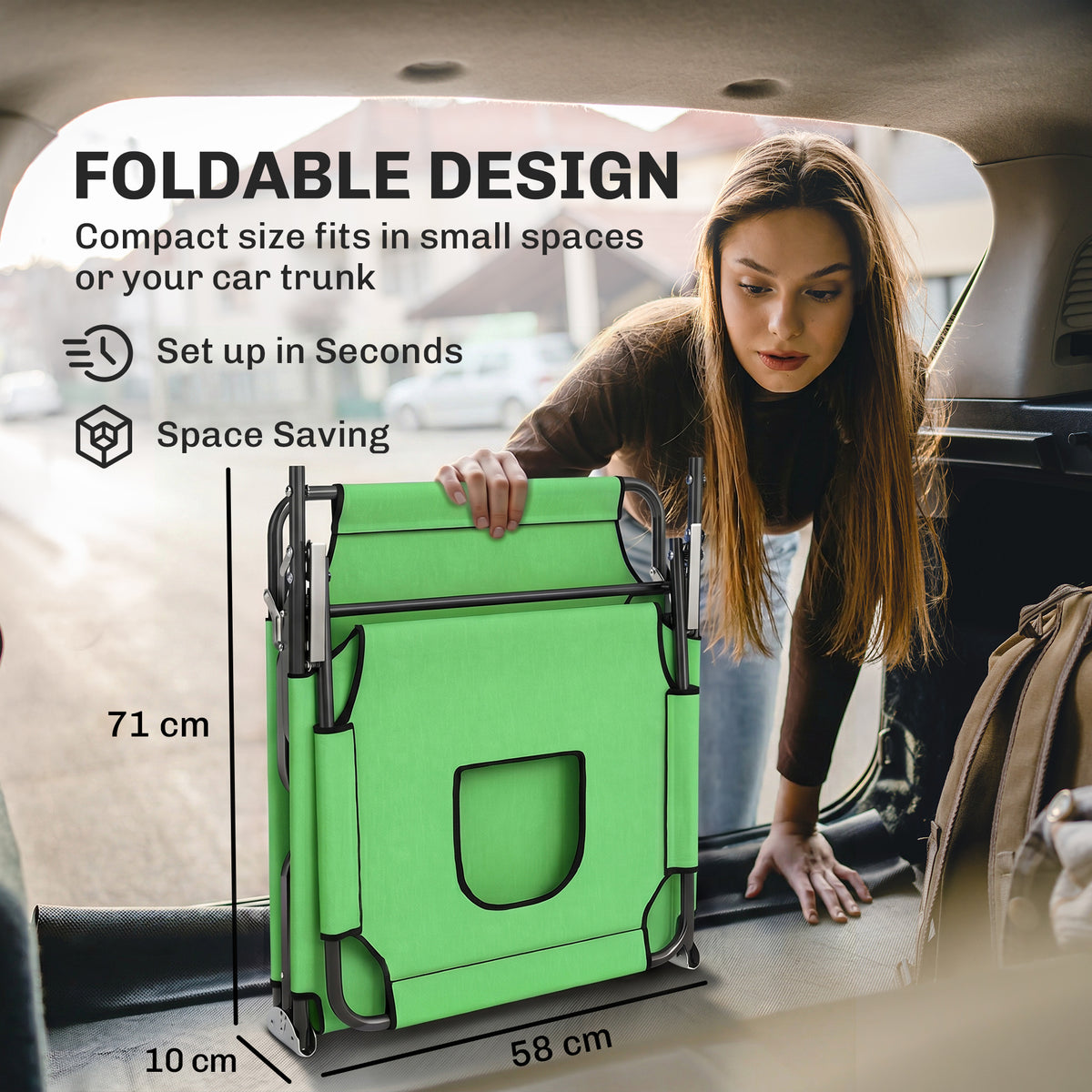 Green folding sun lounger shown compactly folded with a face hole and black metal frame.