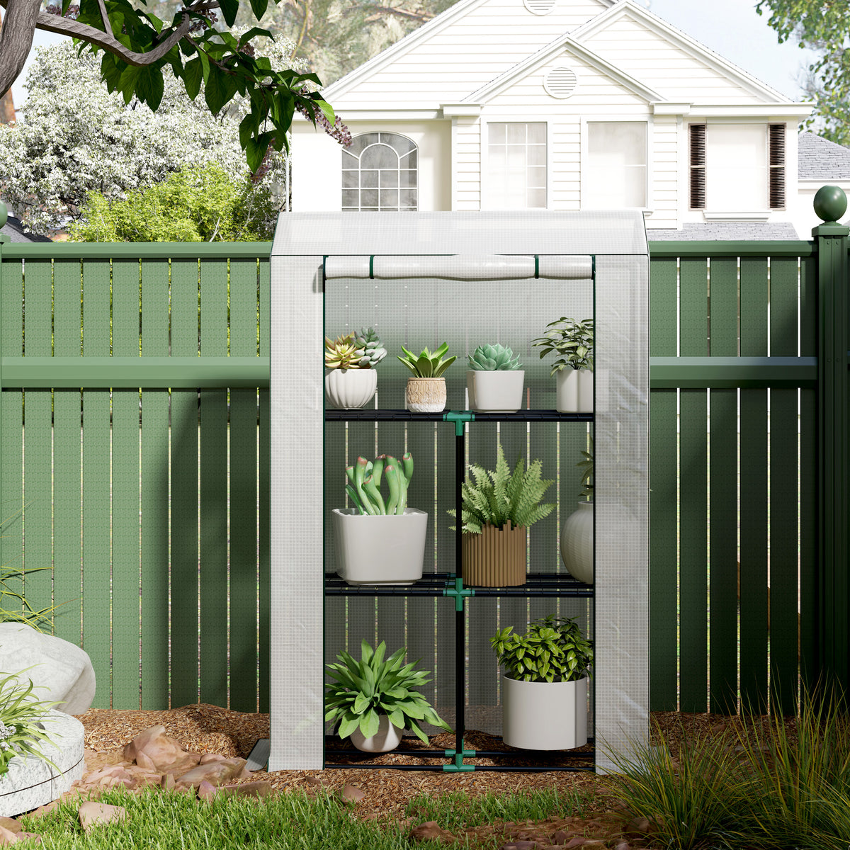 Outsunny white three-tier greenhouse filled with potted plants
