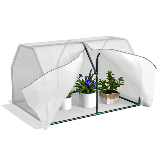 Mini greenhouse with white mesh cover rolled open to access potted plants