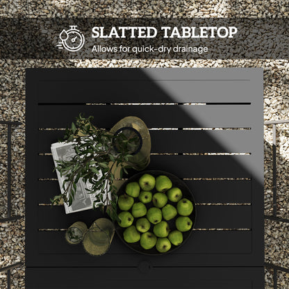 Top view of black slatted dining table with a central umbrella hole