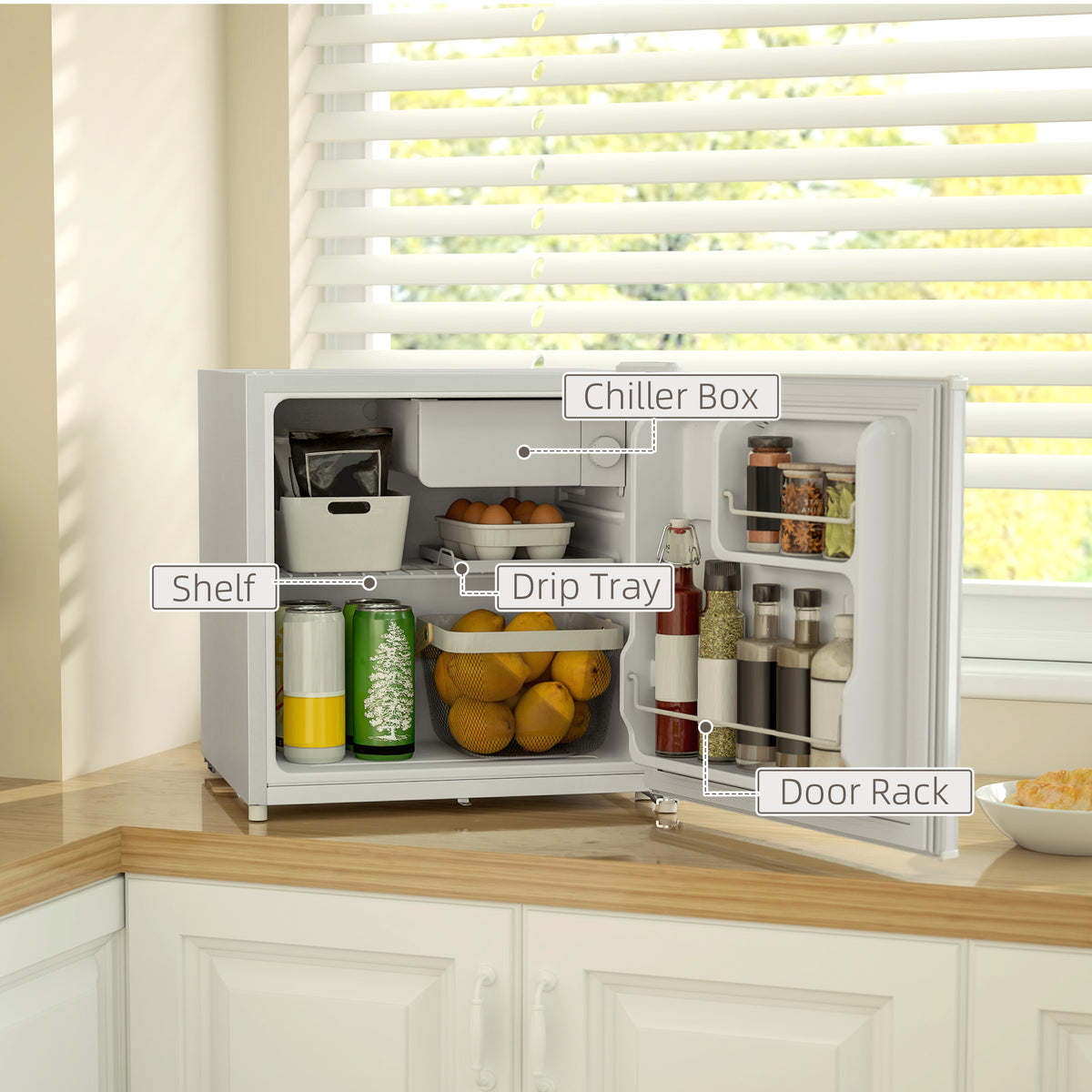 Countertop fridge interior with shelf, chiller box, drip tray and door rack