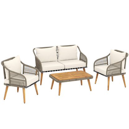 Four-piece rattan patio set with a loveseat, two armchairs, cream cushions, and a slatted wood table
