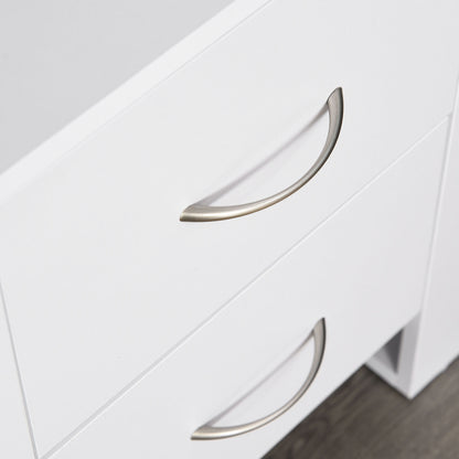 Close-up of two curved metal handles on the white bedside table drawers.