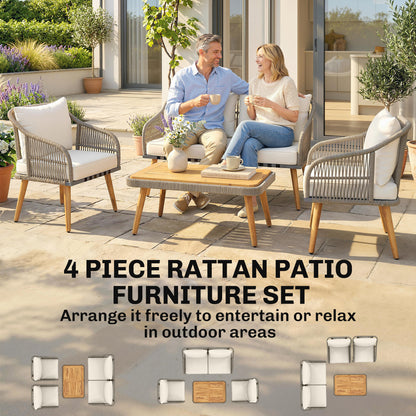 Rattan patio furniture set with cream cushions and slatted wood table arranged for outdoor seating