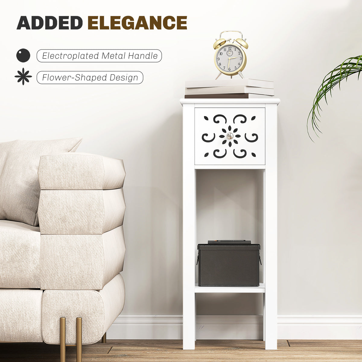 White floral cut-out side table with metal drawer pull and open lower shelf