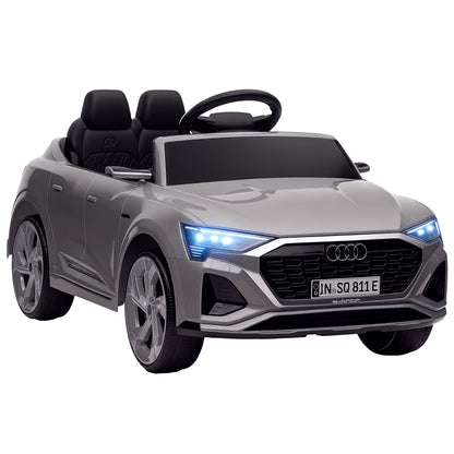 Grey Audi Q8 e-tron Sportback ride-on car with two seats and illuminated headlights