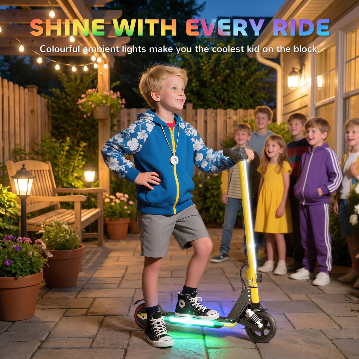 Child riding the gold-tone scooter with colorful lights glowing under the deck