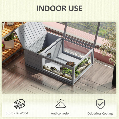 PawHut wooden tortoise house with open lid and mesh roof, shown indoors