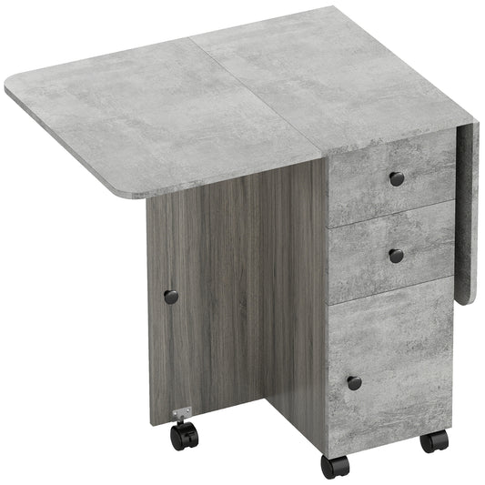 Gray drop-leaf table with three drawers, wood-look cabinet, and caster wheels