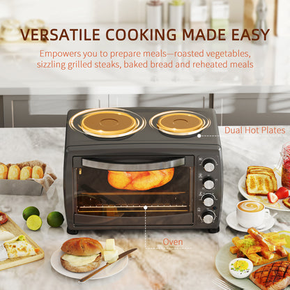 HOMCOM black countertop oven with dual hot plates, roasting food inside and cooking controls