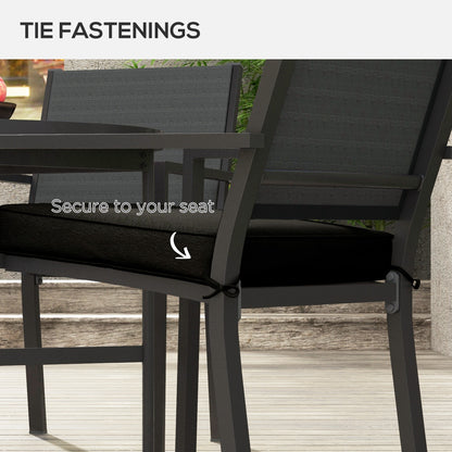 Outsunny black seat cushion secured to a patio chair with tie straps