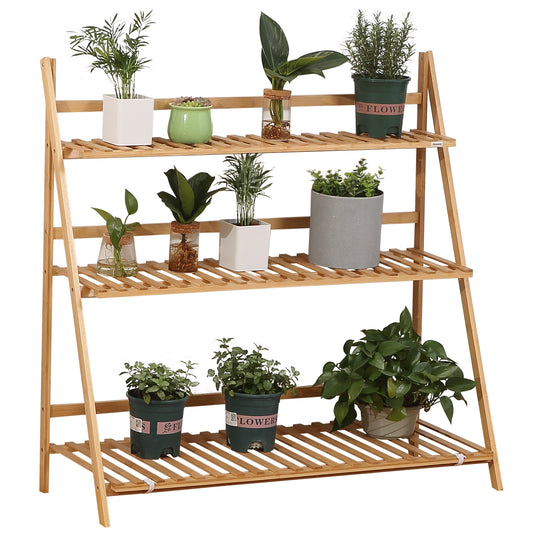 Three-tier bamboo plant stand holding potted plants on slatted shelves.