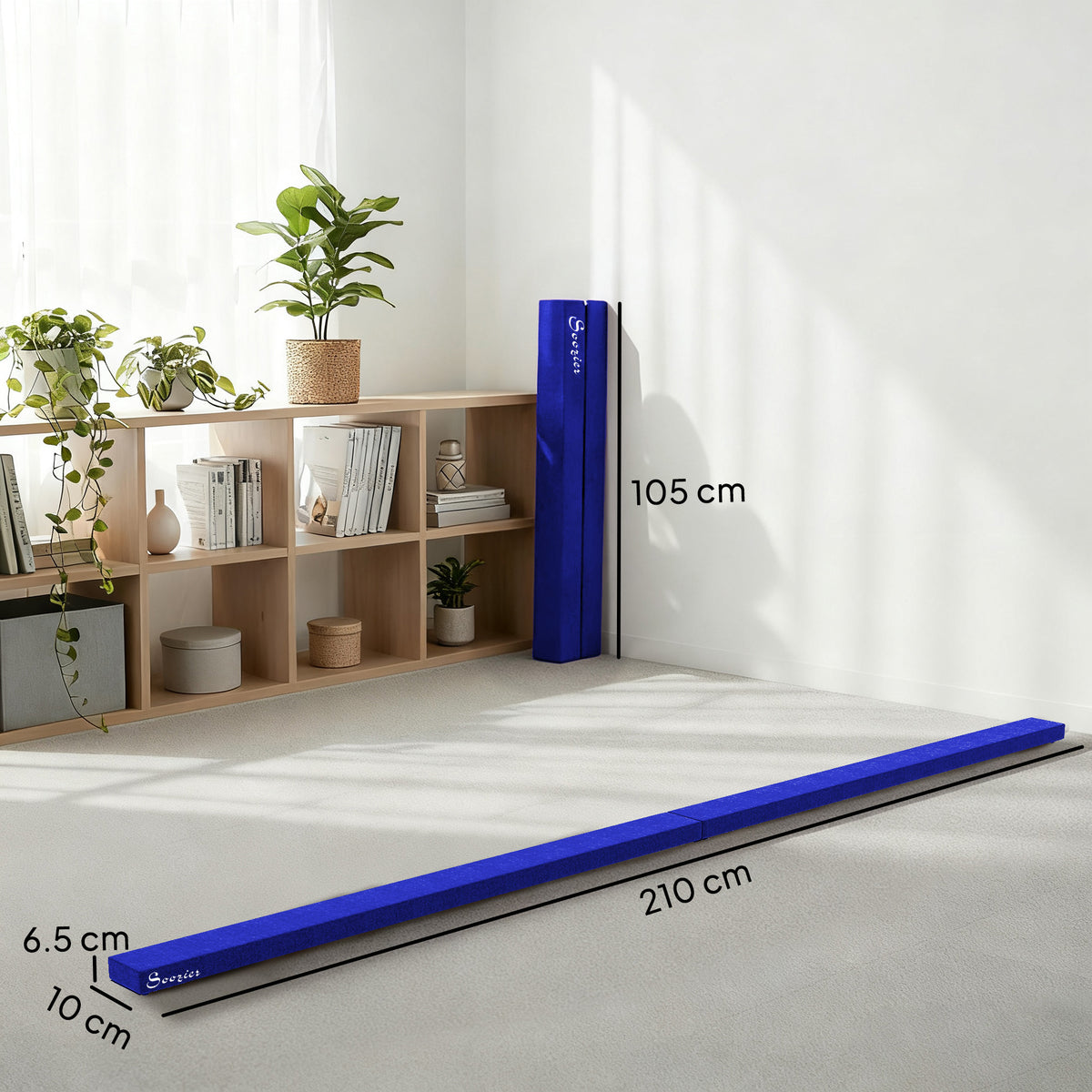 Blue folding balance beam shown extended and folded upright, with dimensions of 210 cm by 10 cm.