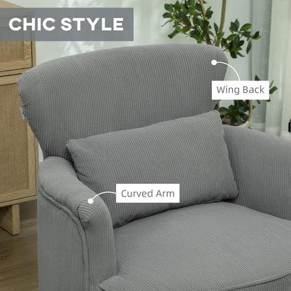 Close view of the chair's corduroy wing back, curved arm, and lumbar pillow