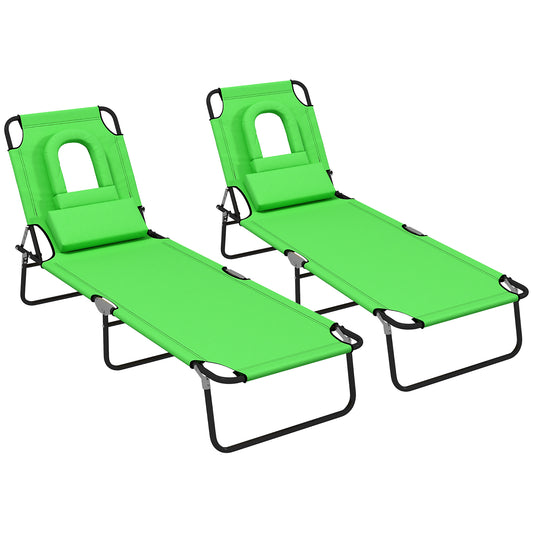Photo of Outsunny Folding Sun Loungers Set of 2 with Face Hole, 4-Position Adjustable Backrest Garden Recliner Chair Sunbed, Outdoor Lounge Chair with 500 D Oxford Cloth Seat, Pillow for Beach, Green in Green colour on a white background
