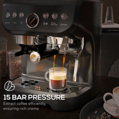 Espresso machine dispensing coffee into a glass from its portafilter