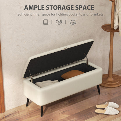 Cream white storage ottoman with its lid raised and storage compartment open