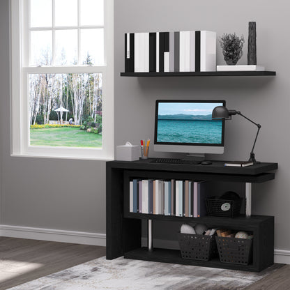 Black computer desk with two open storage shelves, books, and baskets.